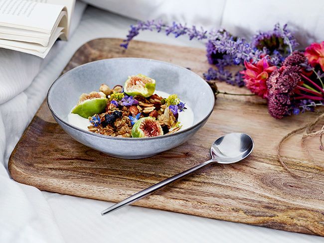 No Mother's Day breakfast is complete without a bowl of crunchy granola in bed, served beautifully on a wooden platter. 