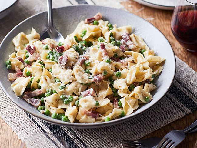 This gorgeous sorpresine pasta with peas and pancetta by Julia Ostro is the perfect family meal.