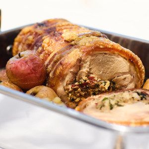 Porchetta with Sage & Fennel Stuffing & Roasted Apples